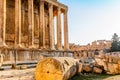 Columns of ancient Roman temple of Bacchus with surrounding ruins of ancient city, Bekaa Valley, Baalbek, Lebanon Royalty Free Stock Photo