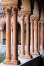 Columns and arches in the medieval cloister of Saint Zeno Royalty Free Stock Photo