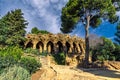 Columns, arches and vegetation at park Guell, Barcelona, Spain Royalty Free Stock Photo