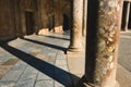 Columns casting shadows in the Charles V Palace at the Alhambra in Granada, Spain Royalty Free Stock Photo