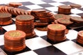 Columns of coins on the chessboard Royalty Free Stock Photo