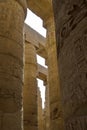 Columns of complex of Karnak temple with ancient egyptian hieroglyphs and symbols. Great Hypostyle Hall at Temples of Karnak Royalty Free Stock Photo