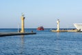 Columns with deer statues in Mandraki harbor of Rhodes town, Greece