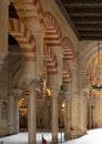 Columns and double-tiered arches of the Mosque-Cathedral of Cordoba in the Spanish region of Andalusia, Spain. Royalty Free Stock Photo