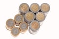 Columns of euro coins in shape of arrow up