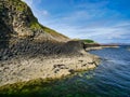 Columns of jointed volcanic basalt rocks on the island of Staffa in the Inner Hebrides, Scotland Royalty Free Stock Photo