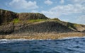 Columns of jointed volcanic basalt rocks on the island of Staffa in the Inner Hebrides, Scotland Royalty Free Stock Photo