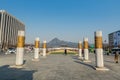 Columns next to Statue of the Sejong daewang, at the Gwanghwamun Square and background of Gyeongbokgung palace in Seoul of South