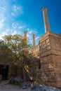 Columns of Portico and tree on the Acropolis of Lindos Rhodes, Royalty Free Stock Photo