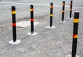 Columns that restrict the movement of vehicles and Parking, bars for limiting the movement, limiters or blocker Royalty Free Stock Photo