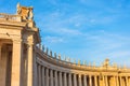 Columns in Saint Peter`s Square evening sunset light, Vatican