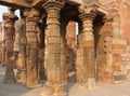 Columns with stone carving in courtyard of Quwwat-Ul-Islam mosqu Royalty Free Stock Photo