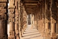 Columns with stone carving in courtyard of Quwwat-Ul-Islam mosque, Qutab Minar complex, Delhi Royalty Free Stock Photo