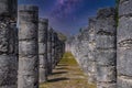 Columns of the Thousand Warriors in Chichen Itza, Mexico with Milky Way Galaxy stars night sky Royalty Free Stock Photo