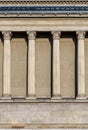 Columns and wall of an old building as an abstract background, architectural details Royalty Free Stock Photo