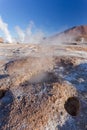 Close up of of colums of hot white smoke. Taken during the sunrise at Geysers of Tatio at Los Flamencos national reserve in