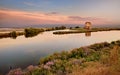 Comacchio, Ferrara, Emilia Romagna, Italy: sunset landscape of the swamp in the Po Delta Park