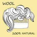 Comb with fleece. beautiful wavy curl of hair on a comb for sheep. one hundred percent natural wool