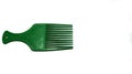 The comb is green on a white background. Designed to be used to comb hair after shampooing