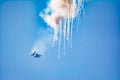 Combat aircraft Su-30. Military aircraft started up fireworks in the sky. Aerobatic teams Russian Knights. Royalty Free Stock Photo