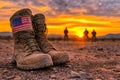 Combat Boots with American Flag Patch in Desert at Sunset Royalty Free Stock Photo