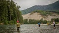 Combat fishing for salmon on the Kitimat River, on a summer morning in British Columbia