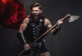 Combat greek warrior screaming and posing in dark background Royalty Free Stock Photo