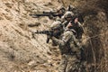 Group of soldiers with rifles before combat