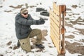 Combat gun shooting training behind and around cover or barricade Royalty Free Stock Photo