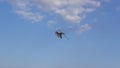 Combat helicopter on the blue sky with dark clouds Royalty Free Stock Photo