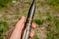 Combat large-caliber ammunition with a bullet in the hands