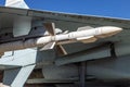 Combat missile under the wing of the fighter-bomber aircraft Royalty Free Stock Photo