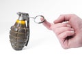Combat pineapple grenade and a hand Royalty Free Stock Photo