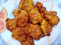 The combed corn is mixed with eggs and flour and then fried. Perkedel jagung are one of the typical foods from Indonesia.
