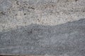 Combinated gray texture with many holes. Marble or granite texture is used as a background.