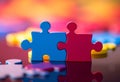 a combination of incongruous colorful puzzle pieces Royalty Free Stock Photo