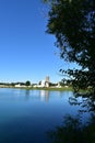 Cement factory in the background of a beautiful lake