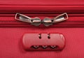 combination lock on a red suitcase Royalty Free Stock Photo