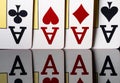 A combination of playing cards of four aces on a reflective surface. Cards for playing poker, blackjack or texas holdem Royalty Free Stock Photo