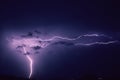 A strong flash of lightning in the sky while a strong storm hits the area between Amsterdam and Rotterdam, The Netherlands. Royalty Free Stock Photo