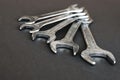 Combination wrenches for car repair on grey table Royalty Free Stock Photo