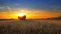 Combine, field and sunrise Royalty Free Stock Photo