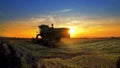 Combine, field and sunrise Royalty Free Stock Photo