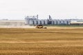 Combine in grain field