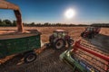 Combine harvester agriculture machine harvesting golden ripe wheat field