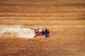 Combine harvester agriculture machine harvesting golden ripe wheat field Royalty Free Stock Photo