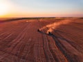 Combine harvester agriculture machine harvesting golden ripe wheat field Royalty Free Stock Photo