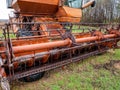 Combine harvester close-up, the mechanism of harvesting wheat Royalty Free Stock Photo