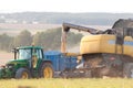 Combine Harvester Discharging Grain Royalty Free Stock Photo