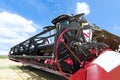 Combine harvester draper head. Agriculture heavy machinery Royalty Free Stock Photo